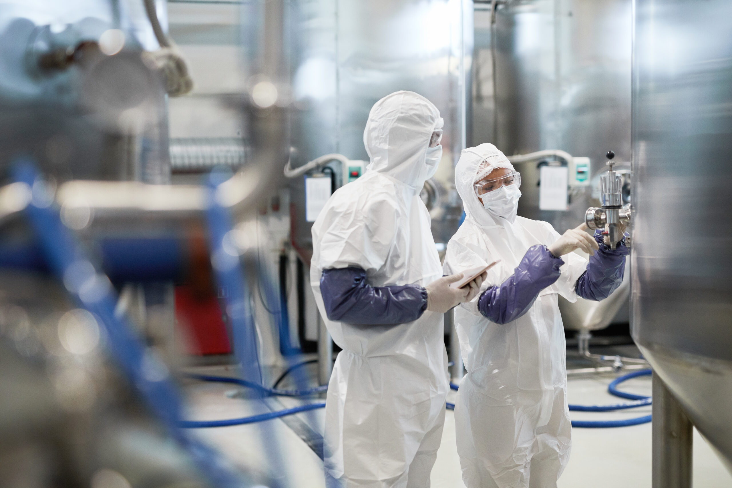 Biomanufacturing team working in a production environment
